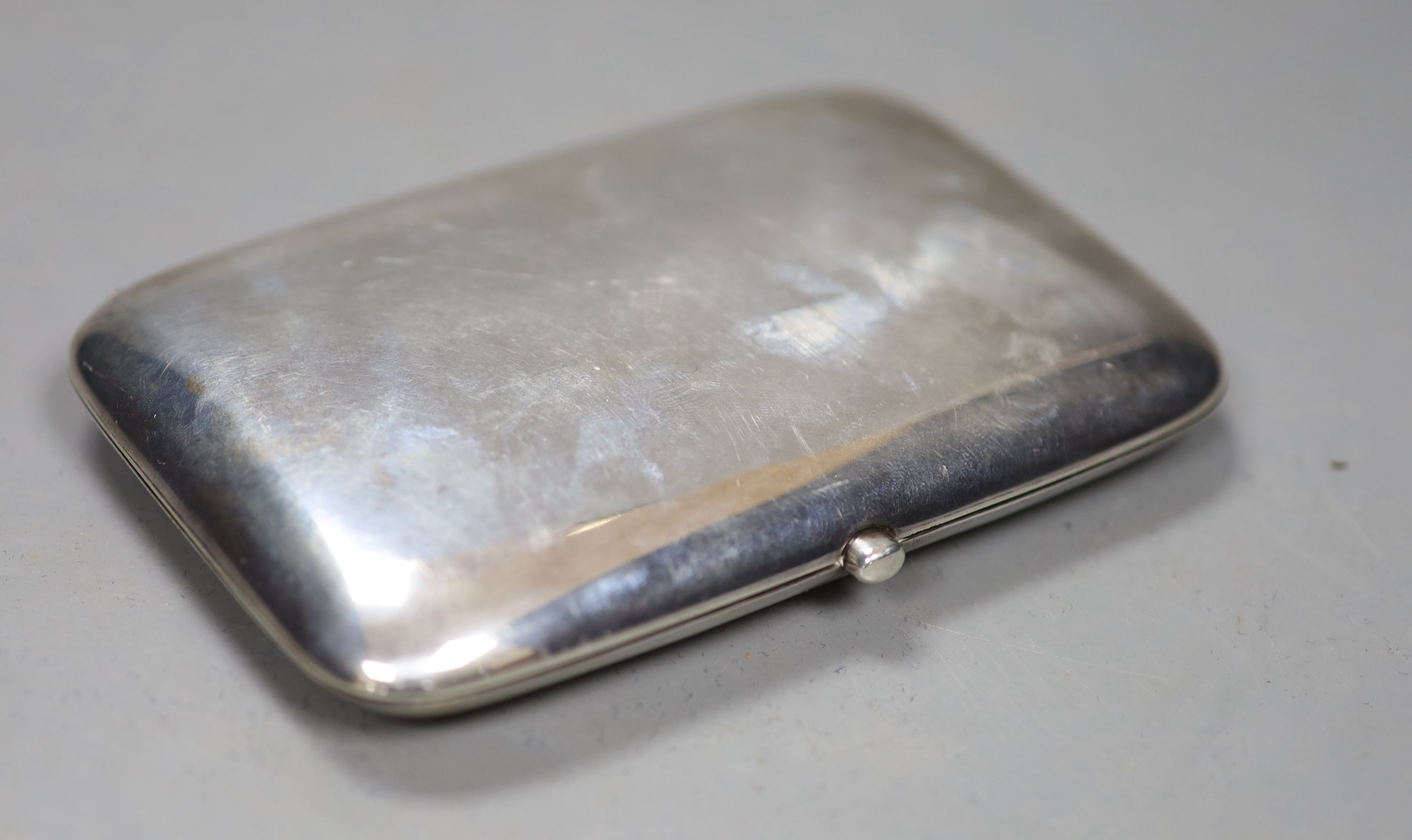 A George V silver cigarette case, Goldsmiths & Silversmiths Co Ltd, London, 1915, 12.8cm, gross 193 grams.